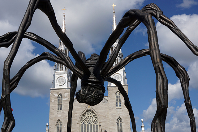 Maman by Louise Bourgeois (with the Notre Dame Cathedral Basilica of Ottawa in the background)